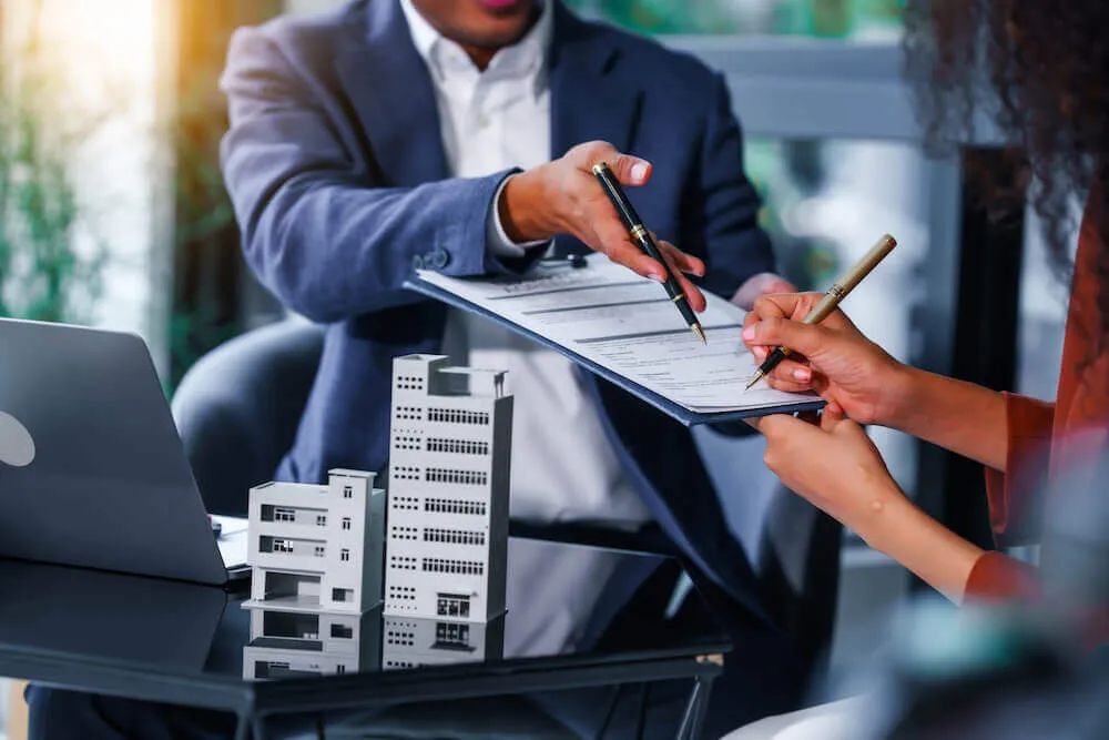 Business professionals reviewing workflow planning